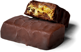 Unwrapped Goldenberg's Peanut Chew candy bars, one with bite out of it